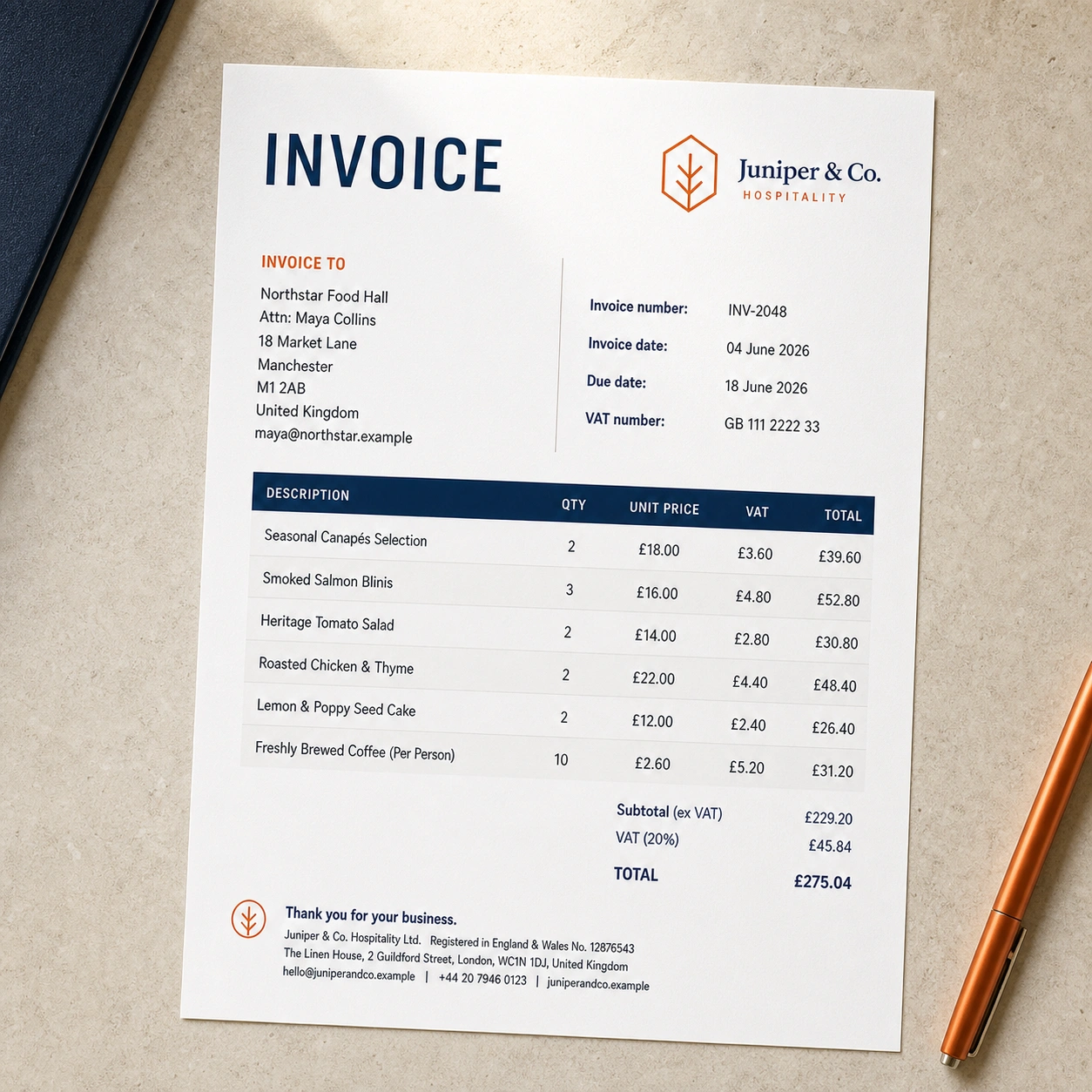 A branded invoice printed on a hospitality workspace
